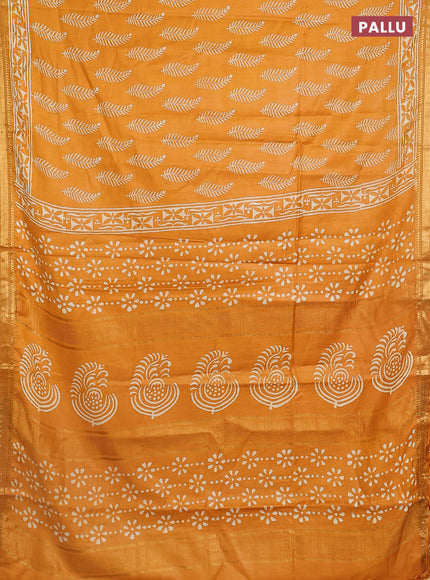 Semi bhagalpuri saree mustard yellow with allover prints and zari woven border