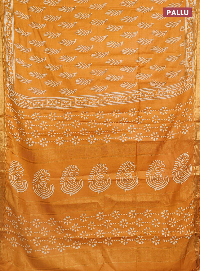 Semi bhagalpuri saree mustard yellow with allover prints and zari woven border