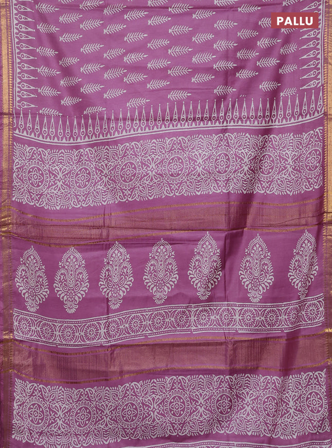 Semi bhagalpuri saree lavender with allover prints and zari woven border