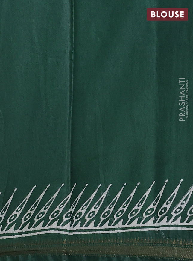 Semi bhagalpuri saree green with allover prints and zari woven border
