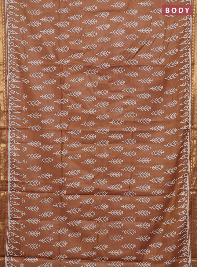 Semi bhagalpuri saree sandal with allover prints and zari woven border
