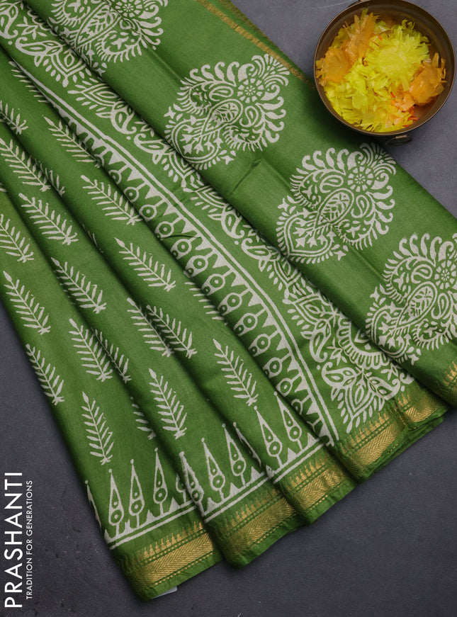 Semi bhagalpuri saree light green with allover prints and zari woven border