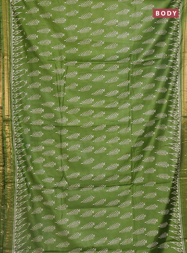 Semi bhagalpuri saree light green with allover prints and zari woven border