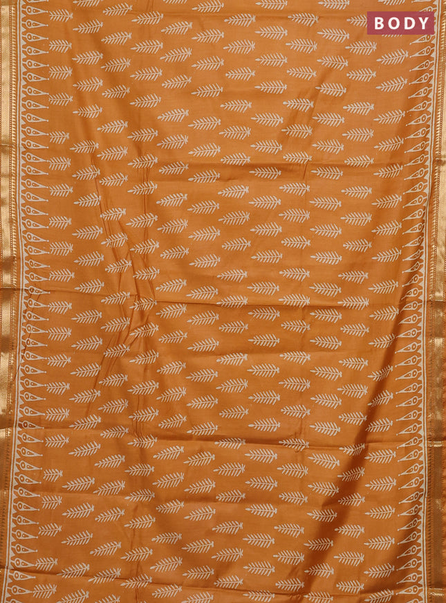 Semi bhagalpuri saree mustard yellow with allover prints and zari woven border