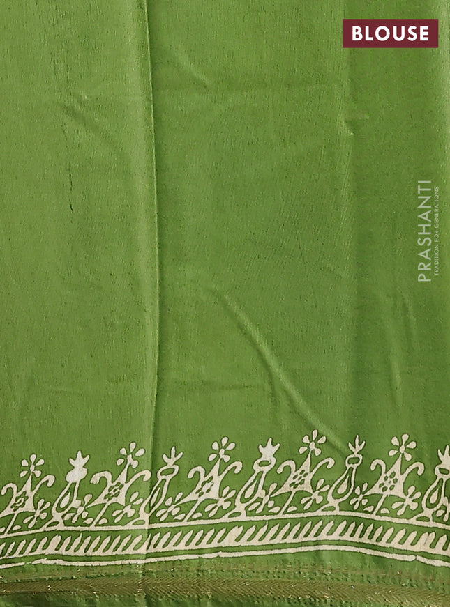 Semi bhagalpuri saree light green with allover prints and zari woven border