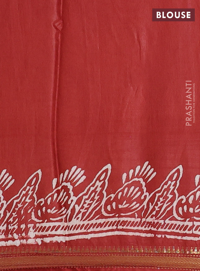 Semi bhagalpuri saree rust with allover prints and zari woven border
