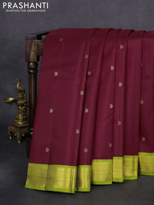 Pure kanchipuram silk saree maroon and fluorescent green with paisley zari woven buttas and zari woven korvai border