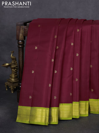 Pure kanchipuram silk saree maroon and fluorescent green with paisley zari woven buttas and zari woven korvai border