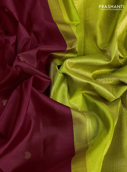 Pure kanchipuram silk saree maroon and fluorescent green with paisley zari woven buttas and zari woven korvai border