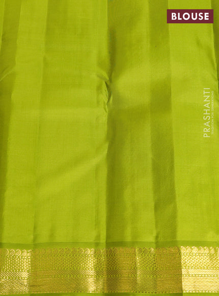 Pure kanchipuram silk saree maroon and fluorescent green with paisley zari woven buttas and zari woven korvai border