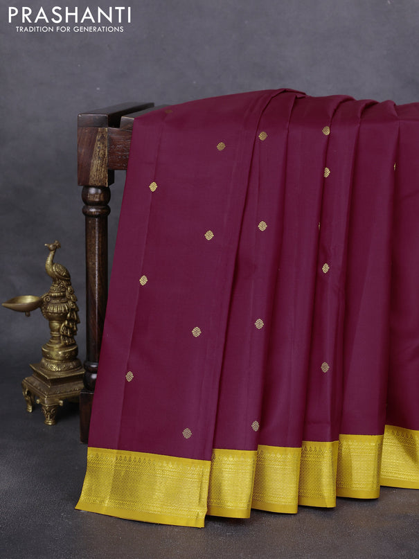 Pure kanchipuram silk saree maroon and mustard yellow with zari woven buttas and zari woven korvai border