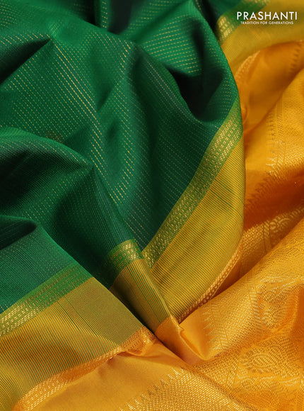 Pure kanchipuram silk saree green and mustard yellow with allover zari weaves & buttas and zari woven korvai border