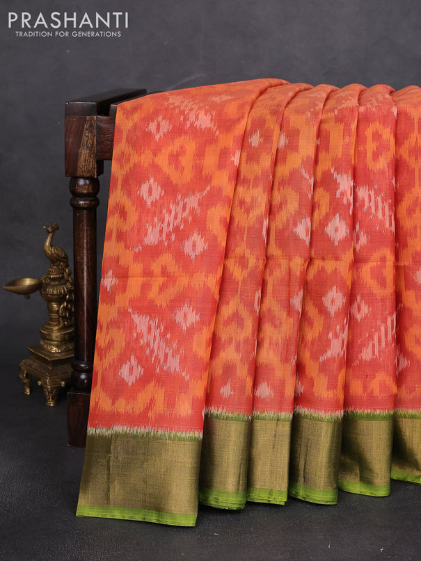 Ikat silk cotton saree orange and light green with alover ikat weaves and zari woven border