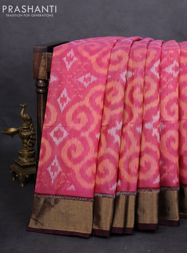 Ikat silk cotton saree pink and deep wine with alover ikat weaves and zari woven border