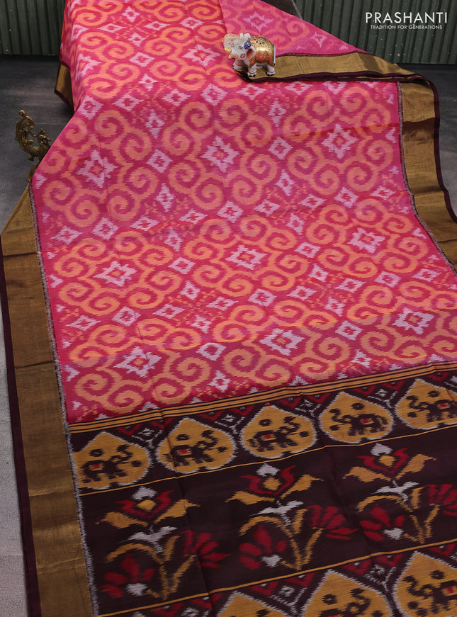 Ikat silk cotton saree pink and deep wine with alover ikat weaves and zari woven border