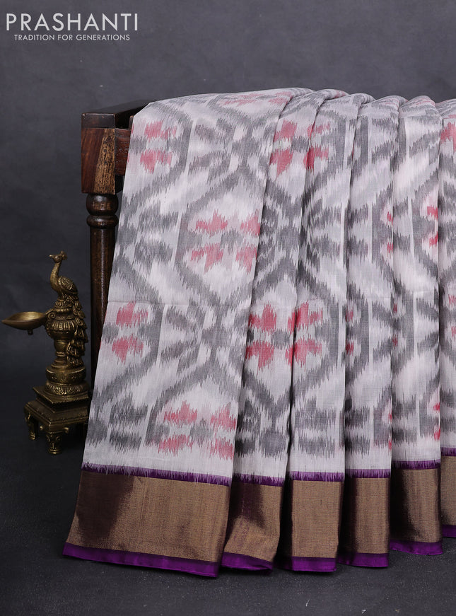 Ikat silk cotton saree off white grey and purple with alover ikat weaves and zari woven border