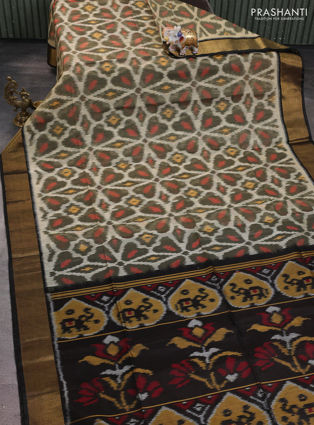 Ikat silk cotton saree cream and deep coffee brown with alover ikat weaves and zari woven border