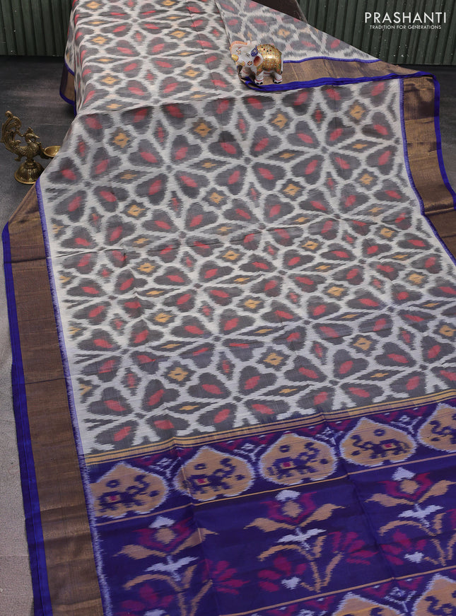 Ikat silk cotton saree off white grey and blue with alover ikat weaves and zari woven border