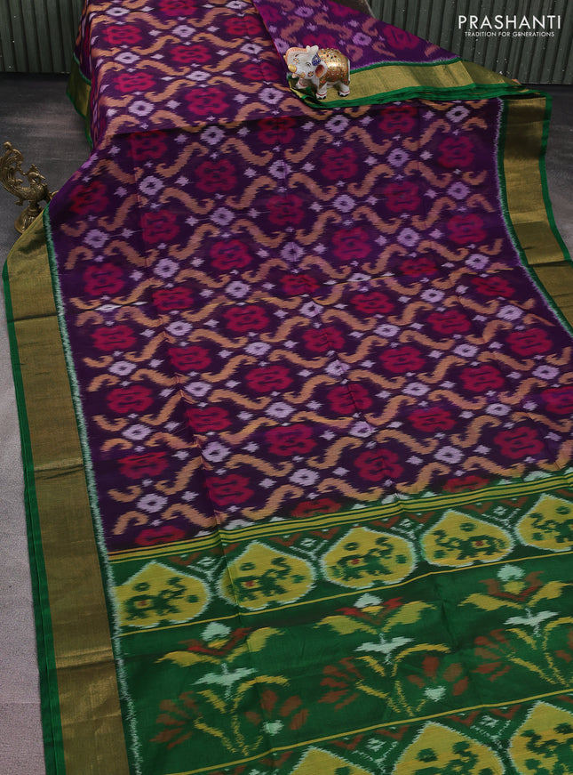 Ikat silk cotton saree purple and green with alover ikat weaves and zari woven border