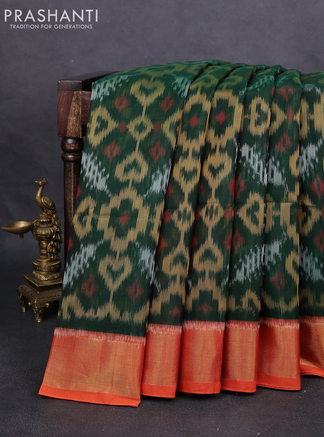 Ikat silk cotton saree green and orange with alover ikat weaves and zari woven border