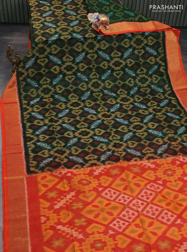 Ikat silk cotton saree green and orange with alover ikat weaves and zari woven border