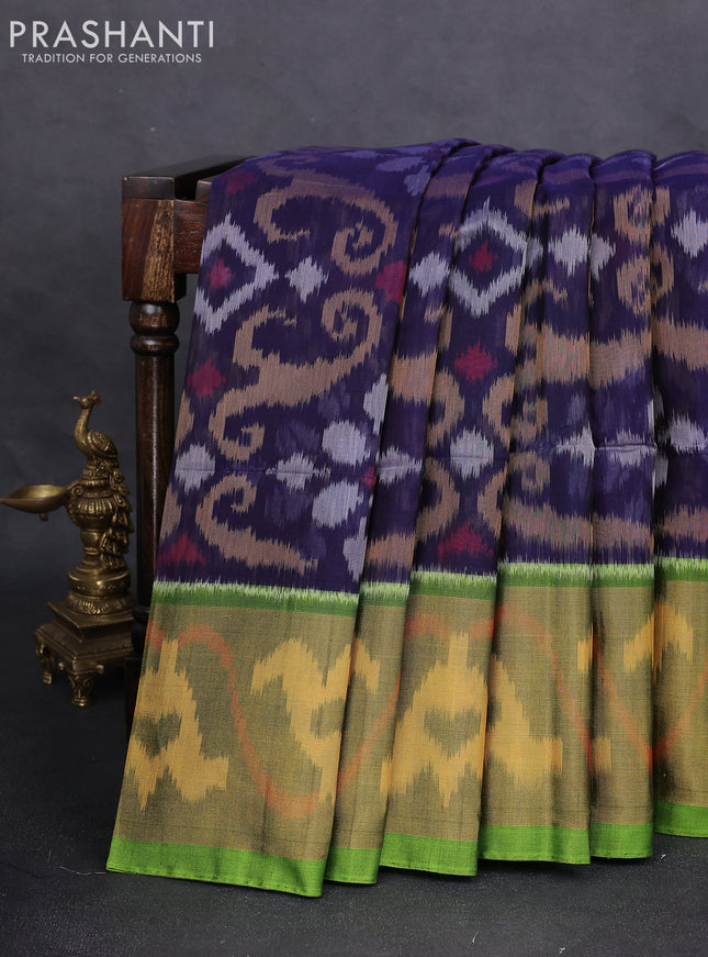 Ikat silk cotton saree navy blue and green with alover ikat weaves and long zari woven ikat border