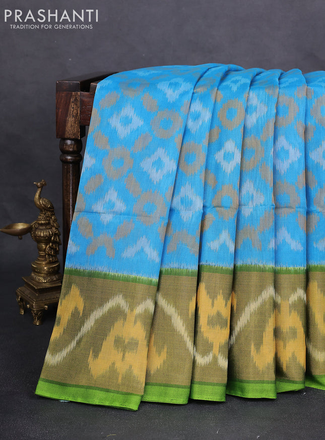 Ikat silk cotton saree light blue and light green with alover ikat weaves and long zari woven ikat border