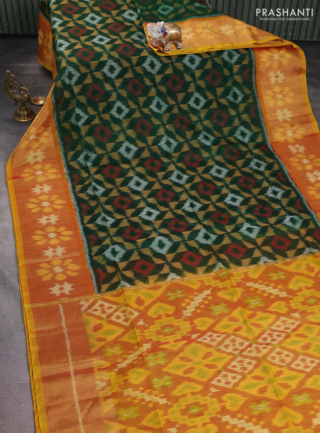 Ikat silk cotton saree bottle green and dark mustard with alover ikat weaves and long zari woven ikat border