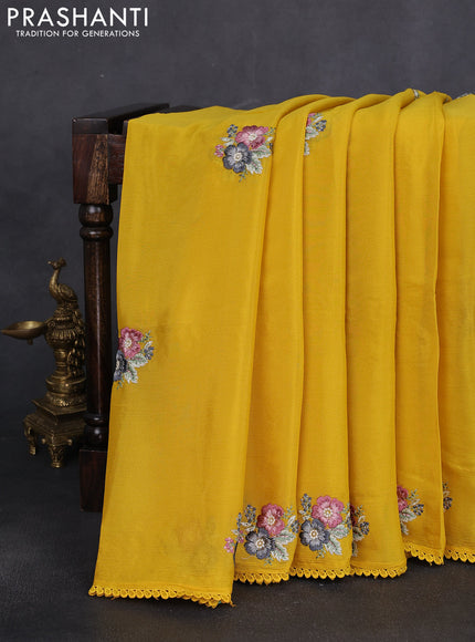Chiffon silk saree mustard yellow with floral embroidery and lace work border