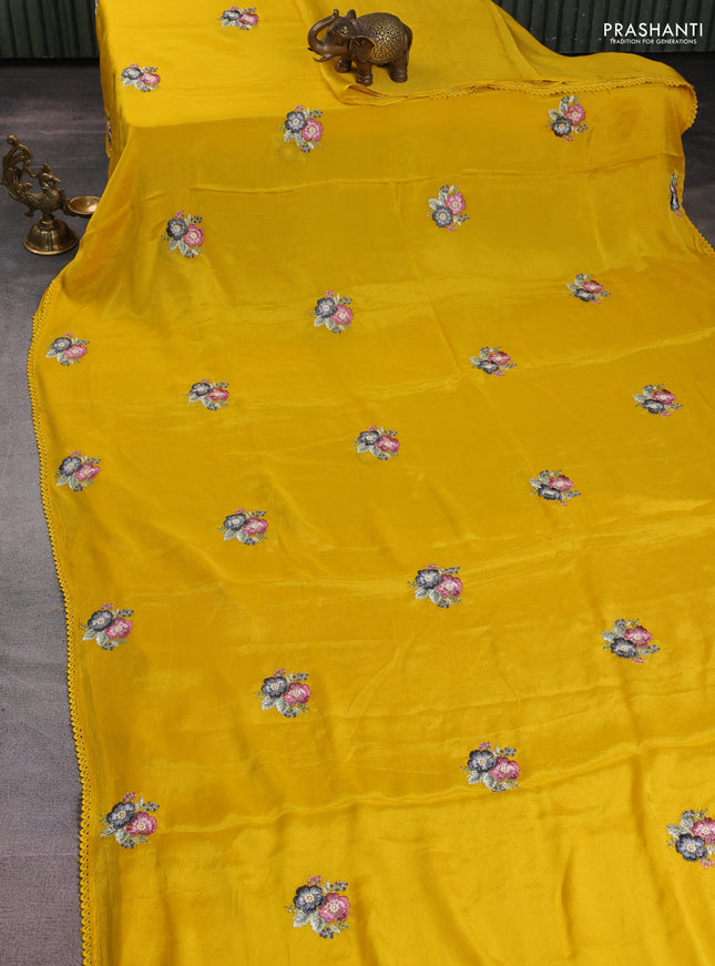 Chiffon silk saree mustard yellow with floral embroidery and lace work border