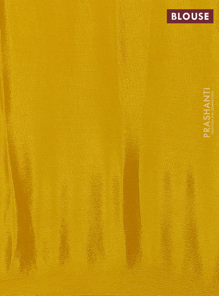 Chiffon silk saree mustard yellow with floral embroidery and lace work border