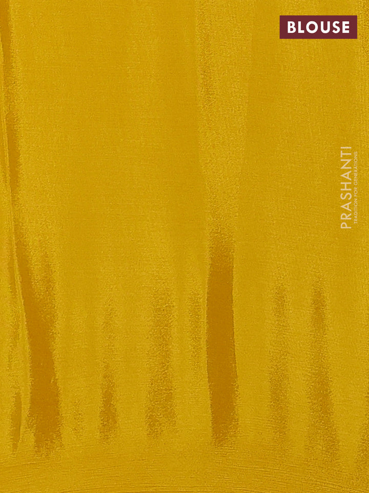 Chiffon silk saree mustard yellow with floral embroidery and lace work border