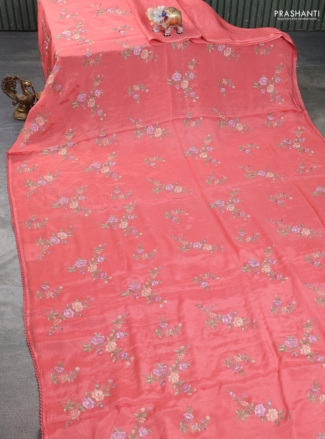 Chiffon silk saree peach shade with floral embroidery and lace work border