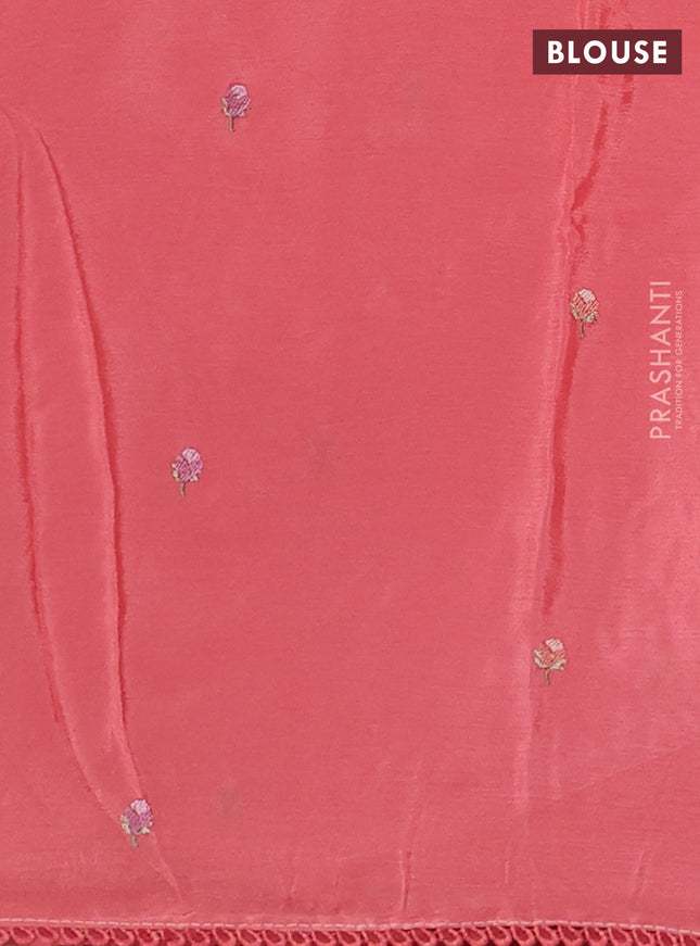 Chiffon silk saree peach shade with floral embroidery and lace work border