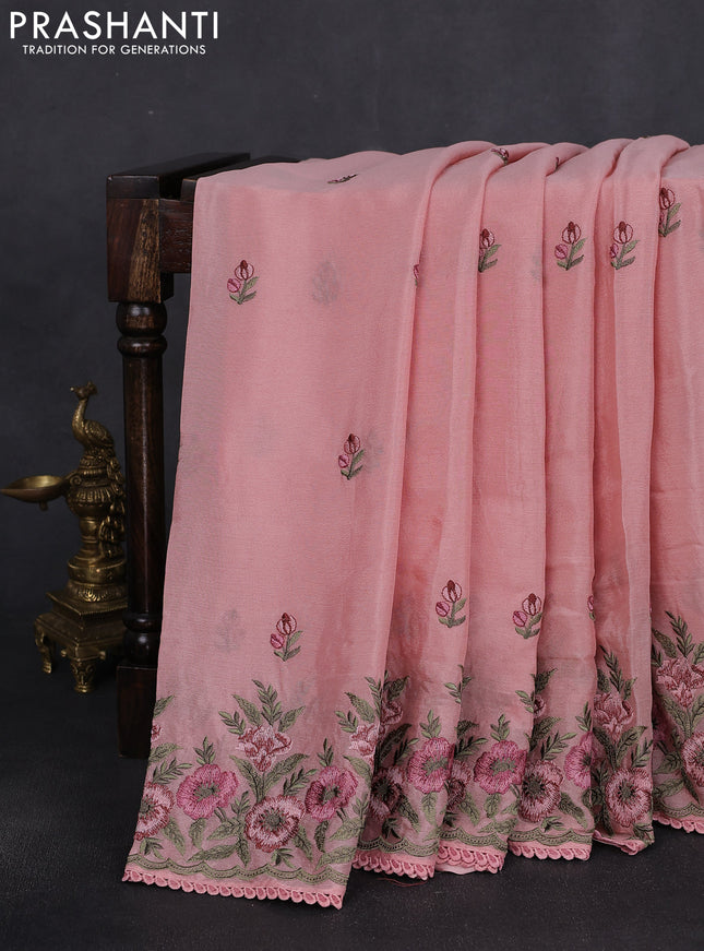 Chiffon silk saree peach shade with floral embroidery and lace work border