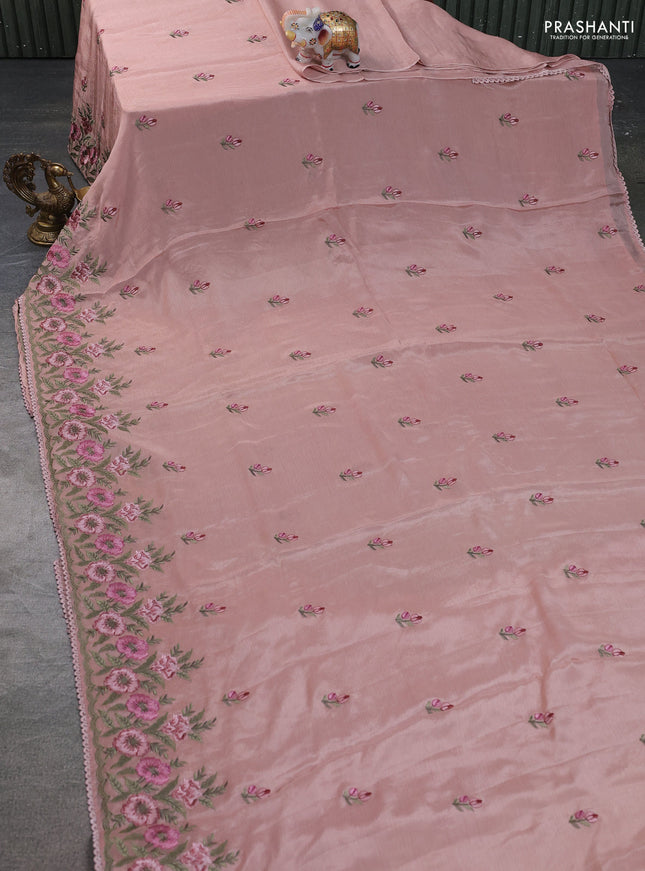 Chiffon silk saree peach shade with floral embroidery and lace work border