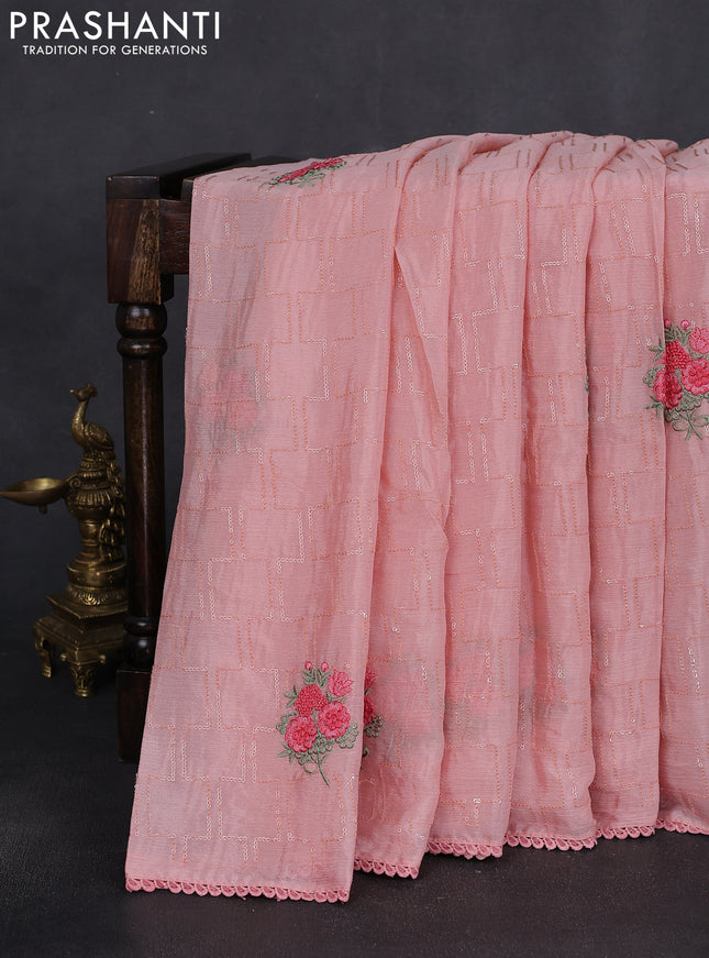 Chiffon silk saree peach shade with sequin work & floral embroidery and lace work border