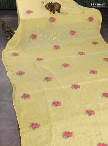 Chiffon silk saree pale yellow with sequin work & floral embroidery and lace work border