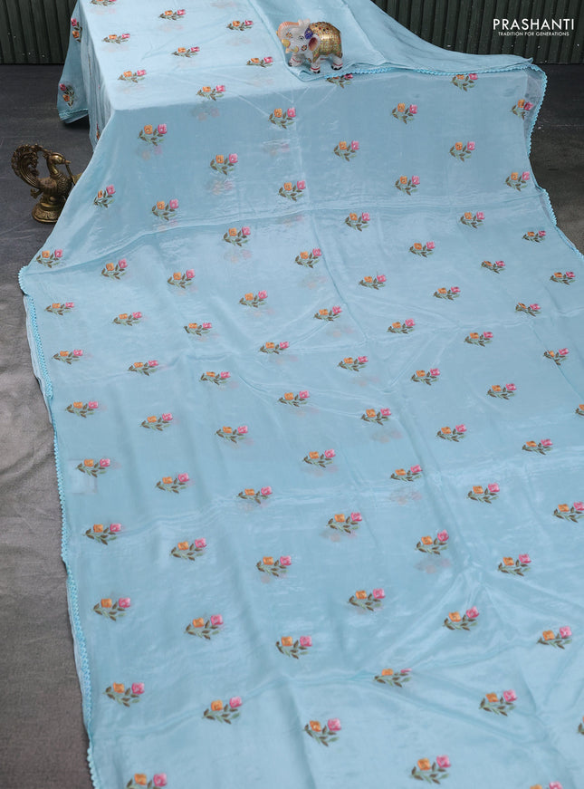 Chiffon silk saree pastel blue with floral embroidery and lace work border