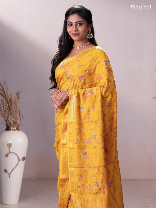 Semi crepe silk saree mustard yellow with allover convent embroidery and elephant zari woven border