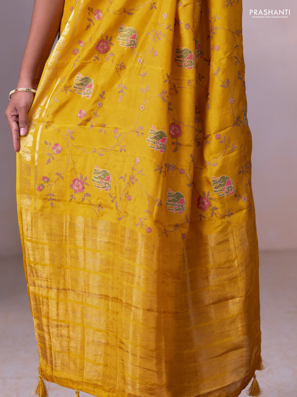 Semi crepe silk saree mustard yellow with allover convent embroidery and elephant zari woven border