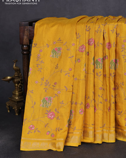 Semi crepe silk saree mustard yellow with allover convent embroidery and elephant zari woven border