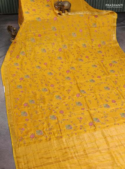 Semi crepe silk saree mustard yellow with allover convent embroidery and elephant zari woven border