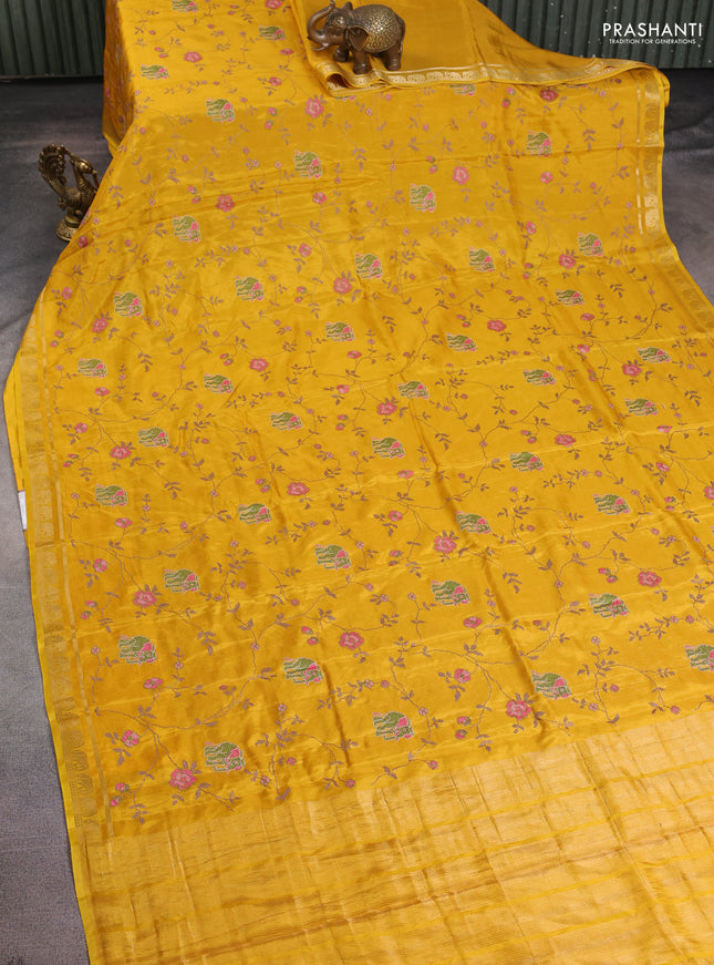 Semi crepe silk saree mustard yellow with allover convent embroidery and elephant zari woven border