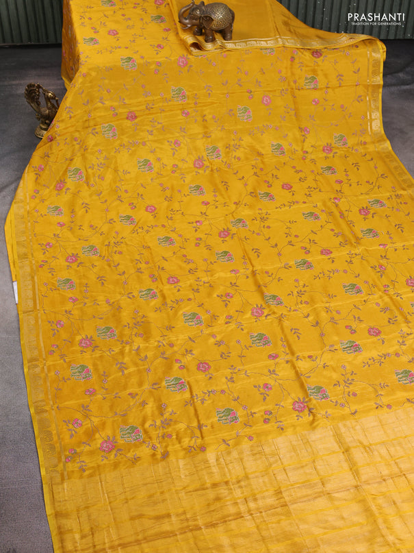 Semi crepe silk saree mustard yellow with allover convent embroidery and elephant zari woven border