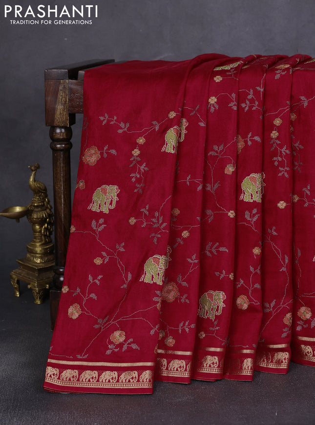 Semi crepe silk saree maroon with allover convent embroidery and elephant zari woven border