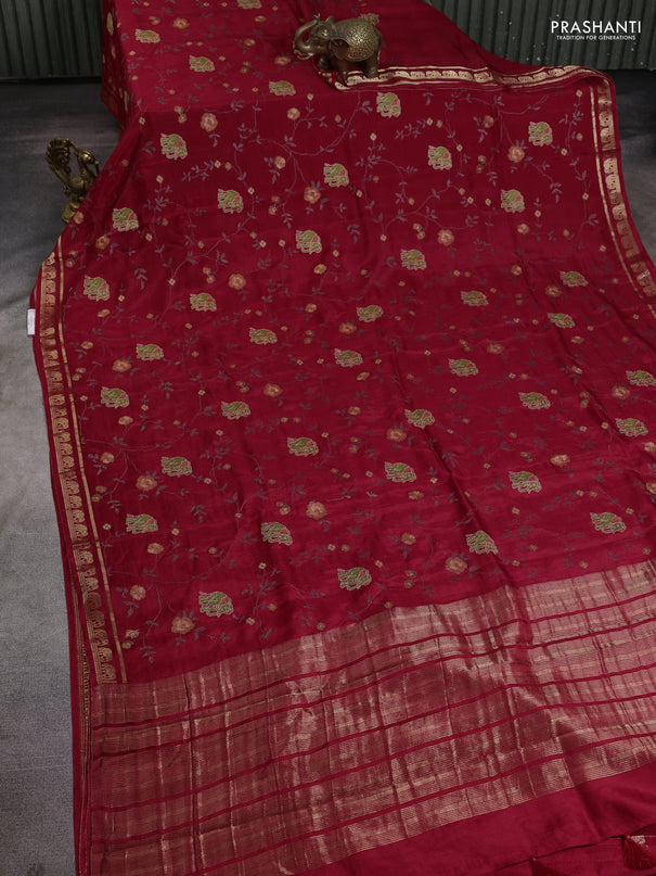 Semi crepe silk saree maroon with allover convent embroidery and elephant zari woven border