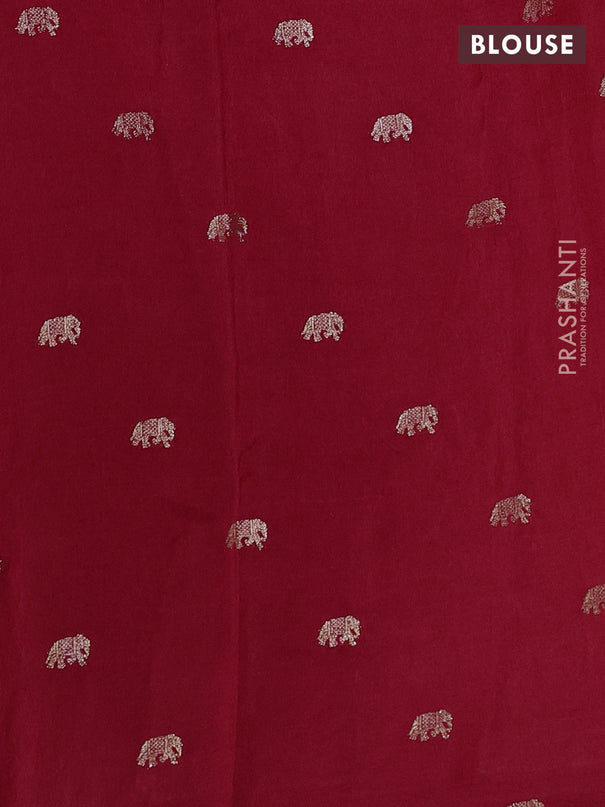 Semi crepe silk saree maroon with allover convent embroidery and elephant zari woven border