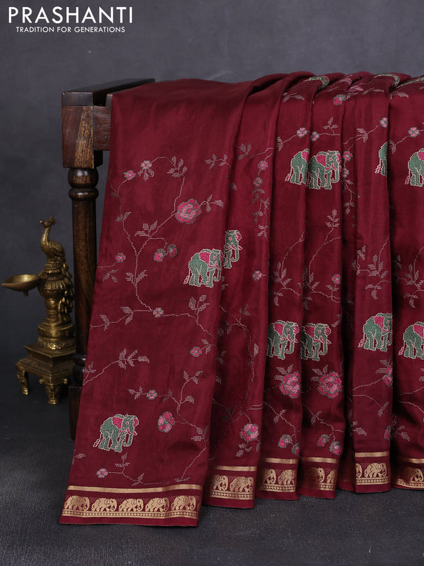 Semi crepe silk saree deep maroon with allover convent embroidery and elephant zari woven border