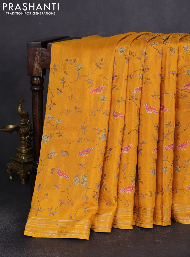 Semi crepe silk saree yellow with allover convent embroidery and temple zari woven border